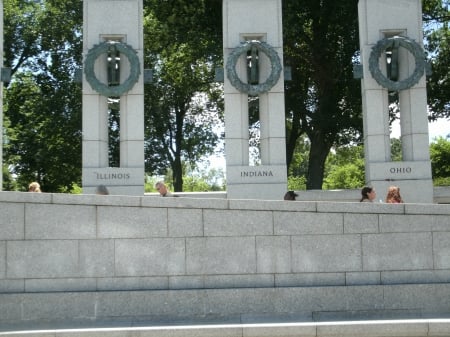 Part of the war mermorial in D.C. - wreath, monuments, trees, war