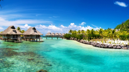 Beach Huts - beach, sky, paradise, water, coast, vacation, clouds, holiday, tropic, skyphoenixx1, ocean, summer, tropical, shore, isle, huts, island, sea