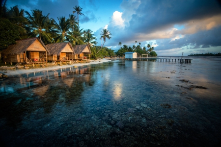 Tropical Evening - clouds, palms, water, beach, cabins, ocean, sky