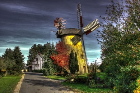 Windmill at Storm - clouds, house, trees, road, dark, wheels