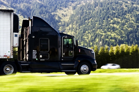 Semi Truck Rolling Down The Road - truck, big rig, semi, mountains