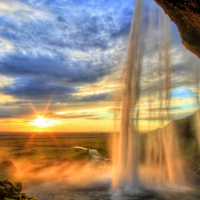 exceptional cave waterfall at sunset hdr