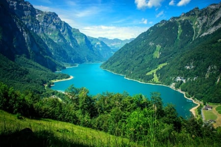 Klontalersee, Switzerland - lake, houses, water, summer, mountains, nature, lake beach, forest, beautiful, clouds, green grass, cliffs