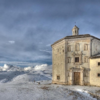 old church on a snowy mountaintop hdr