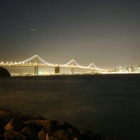 San Francisco Bay Bridge lit up at night