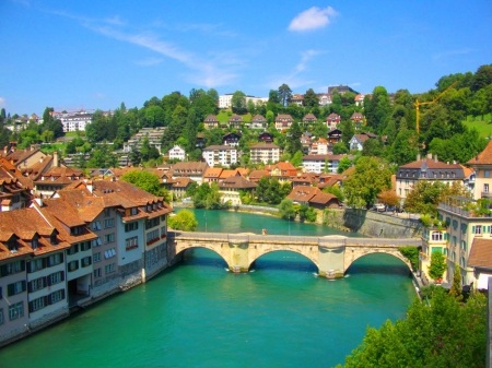 Switzerland's Bern Bridge on a bright day - sky, architecture, houses, towns, bridges, switzerland