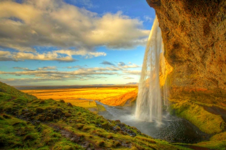 Seljalandsfoss, Iceland - clouds, river, waterfalls, sunset, beautiful, cliffs, grass, field