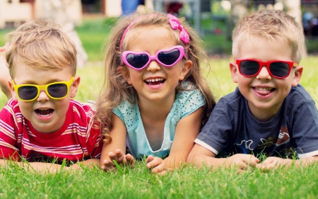 Kids - girl, summer, sunglasses, child, children, yellow, pink, blue, boy, green, smile, grass, happy