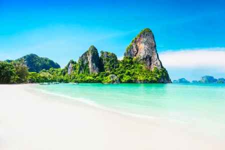 Paradise Beach - sky, beach, trees, paradise, water, coast, vacation, clouds, holiday, tropic, sand, boat, skyphoenixx1, ocean, mountain, hills, palms, summer, tropical, shore, isle, nature, island, sea