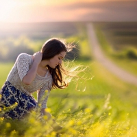 girl picking flowers