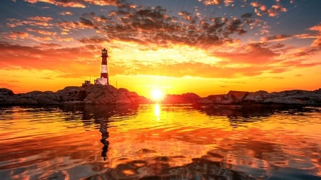 Lighthouse of the Rising Sun - summer, island, sunrise, isle, SkyPhoenixX1, sky, sun, clouds, house, sunlight, water, sea, sunshine, orange, ocean, nature, sunset, rocks