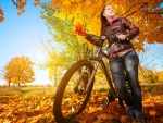 Girl  with Bike in Autumn Park