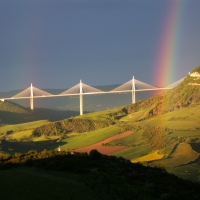 Rainbow over Mountains and Bridge