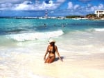 Cowgirl On A Busy Beach