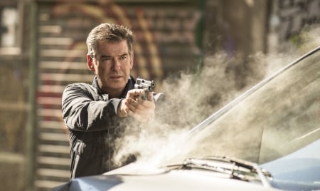 Pierce Brosnan as Devereaux - actor, car, The November Man, gun, movie, man, Pierce Brosnan, Devereaux