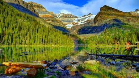 Wooden bench on lakeside - sky, landscpae, bench, cottages, view, reflection, v rocks, lakeside, cliffs, houses, lake, mountain, wooden, shore, lovely, nature, forest, tranquil, beautiful, mirror, cabin