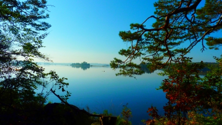 Lake Asnen, Sweden - calm, trees, hills, beautiful, end of summer, blue sky, lake