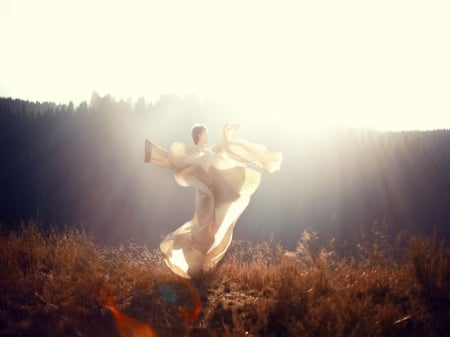 Feeling the Wind - women, sky, hills, trees, sun, mountains, white gown, clouds, dancing