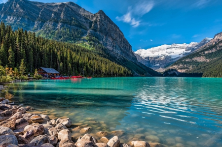 Moraine Lake, Banff National Park - firs, alberta, boats, canada, wate, mountains, house, stones