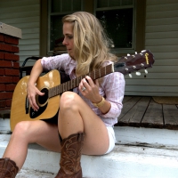 Guitar Playing Cowgirl