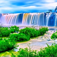 WATERFALLS UNDER the clear BLUE SKY