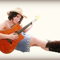 Cowgirl With Her Guitar