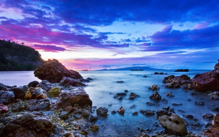 Sunset over Rocky Beach - rocky, nature, blue, beaches, sunsets, sky