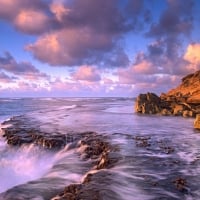 waves splashing against the shore