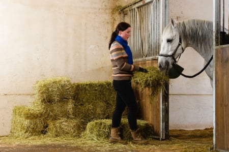 Cowgirl Feeding Her Horse - women, fun, girls, models, female, hay, cowgirl, cowgirls, fantasy, western, horses, barns, style, fashion, bales, boots, rodeo, horse, ranch