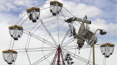 Plane Files into Ferris Wheel - ferris wheel, queensland, townsville, australia, ultra-light plane