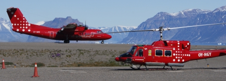 Helicopter and de Havilland Canada Dash 7 aircraft at Qaarsut Airport