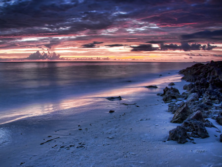 Beach at sunset - sunset, beach, cloudy sky, sand, rocks