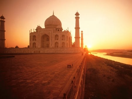 the taj mahal at sunset