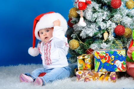 With Santa's hat - kid, adorable, hat, toys, winter, child, funny, christmas, santa, baby, pretty, holiday, sweet, tree, cute, decoration