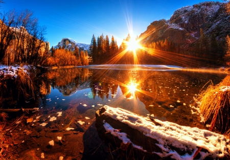 Winter sun - sky, dazzling, trees, sun, mountains, rocks, reflection, river, rays, lake, landscape, mountain, winter, lovely, nature, glow, snow, beautiful, sunrise