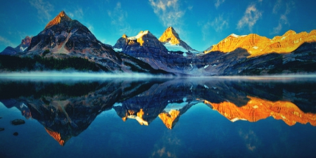 Symmetry At Sunrise - calm, blue, beautiful, snowy peaks, sunrise, forest, reflection, morning fog, lake, mountains