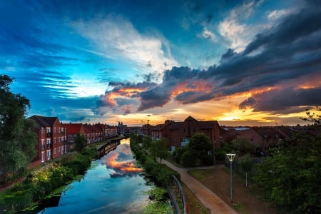 Blue Radiant - beautiful, yellow, sky, houses, clouds, city, canal, trees, sunset, park