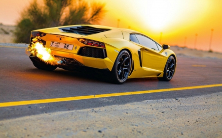 Lamborghini Burning up the Highway - yellow, flames, cars, lamborghini