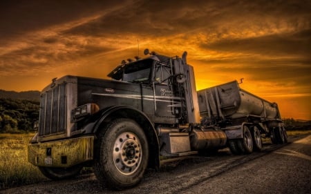 Peterbilt With An End Dump Trailer