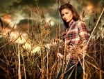 Cowgirl In A Field