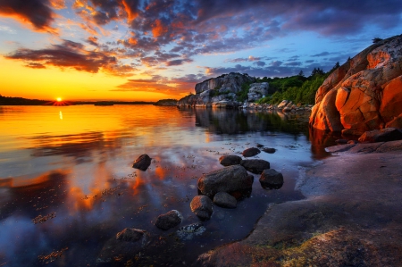 Sunset coast - rays, lake, beach, sky, shore, sunset, lovely, coast, rocks, glow, amazing, reflection, clouds, beautiful, awesome, stones