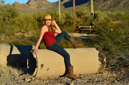 Concrete Bench - jeans, cowgirl, boots, pipe