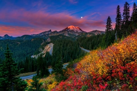 Mountain Sunset - moon, sky, trees, snowy peaks, mountains, sunset, road, forest, beautiful, clouds, nature colors, shrubs