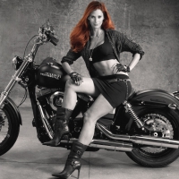 Redhead beauty on Harley