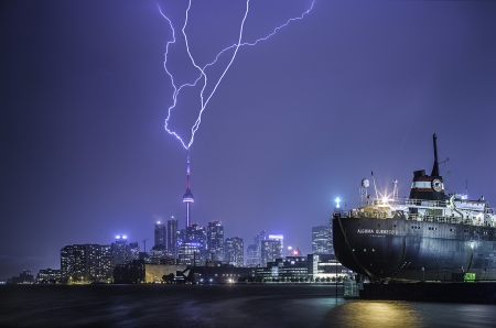 Bull's Eye - bolt, forces, blue, ship, sea, night, nature, electric, lights, lightning, sky