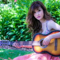 Oriental Woman with Guitar