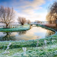 Frosty Field At Sunrise