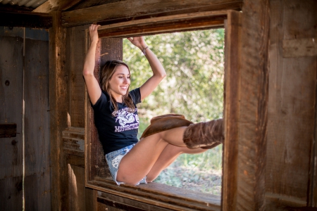 Cowgirl In A Window - style, girls, western, women, window, models, hats, ranch, cowgirls, brunettes, fun, female, boots, fashion