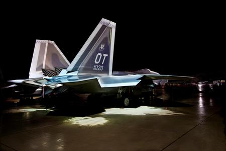 F-22 in the Rain - jet, wing, recon, fighter, carrier