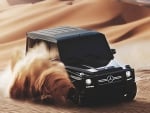 Mercedes G63 AMG playing in the sand